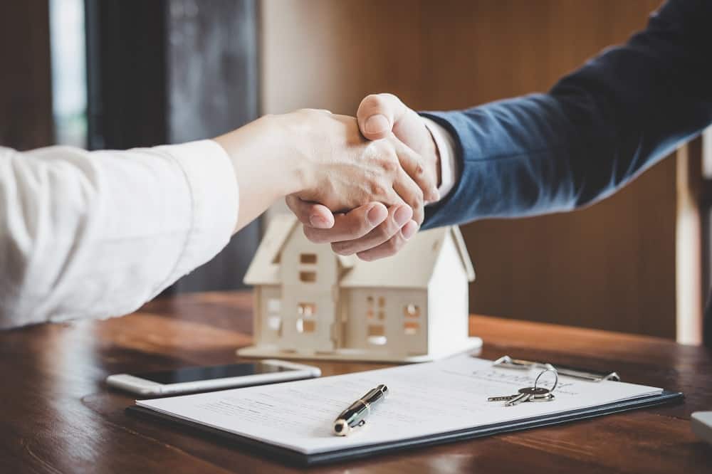 Real Estate Deal Handshake condos for sale in toronto
